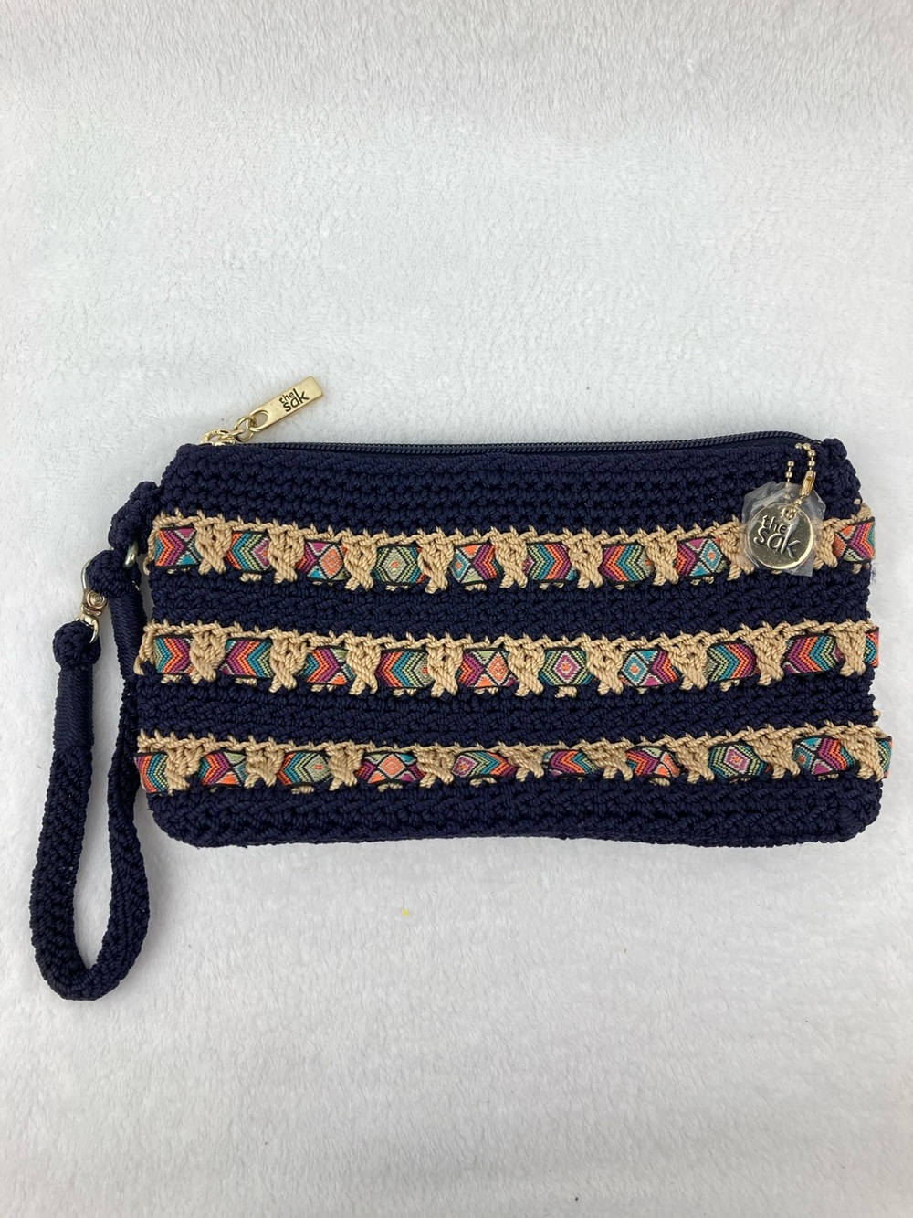 The Sak Cambria Navy & Tan Crochet Wristlet 9” x 5”